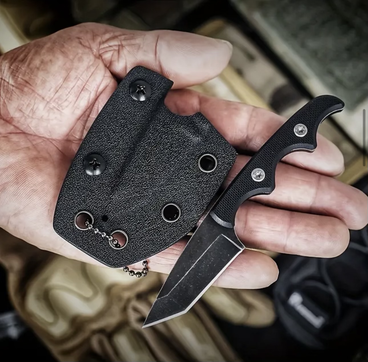 Tactical knife with kydex sheath